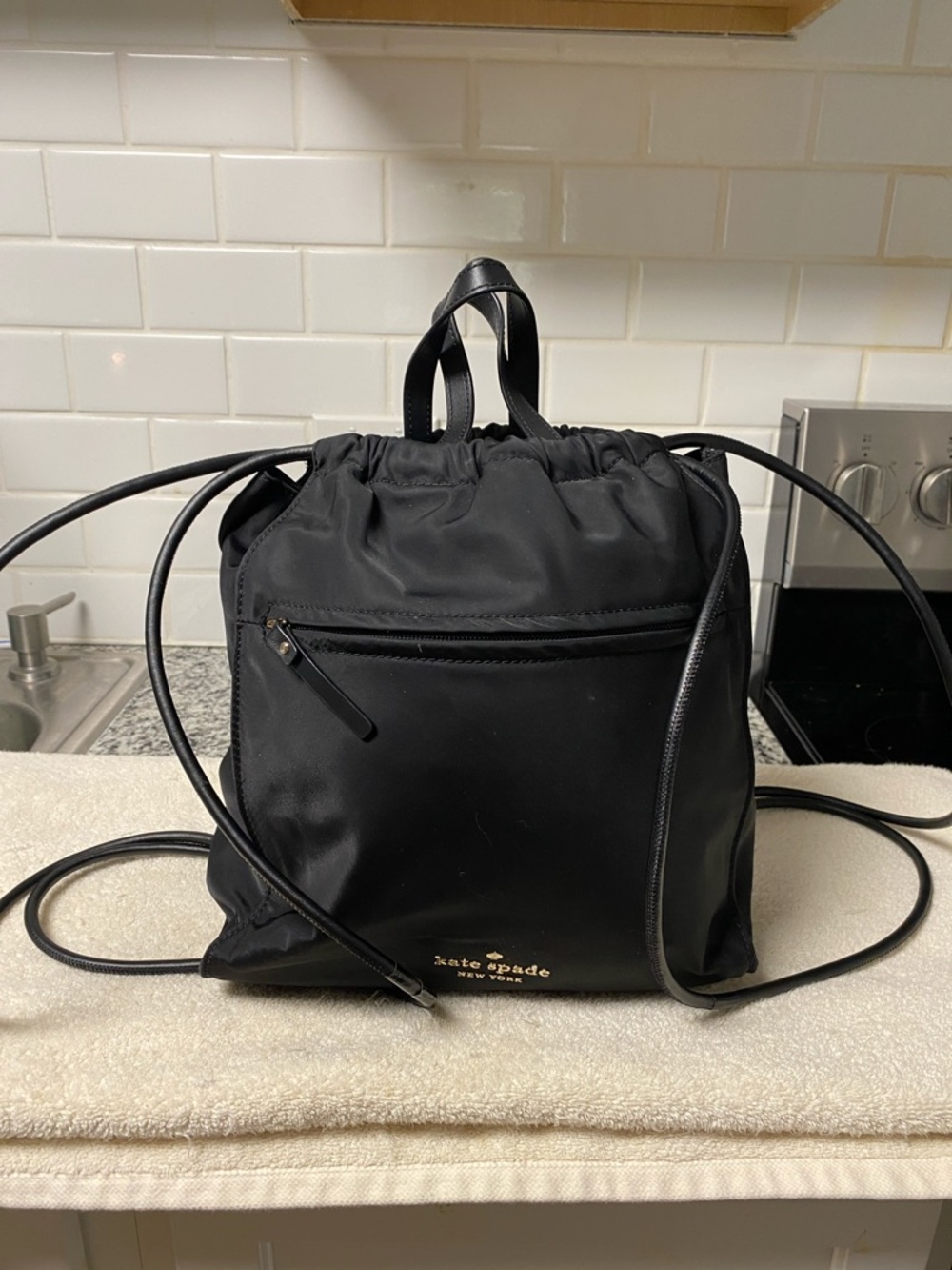 kate spade Black Nylon Drawstring Backpack with Gold Logo